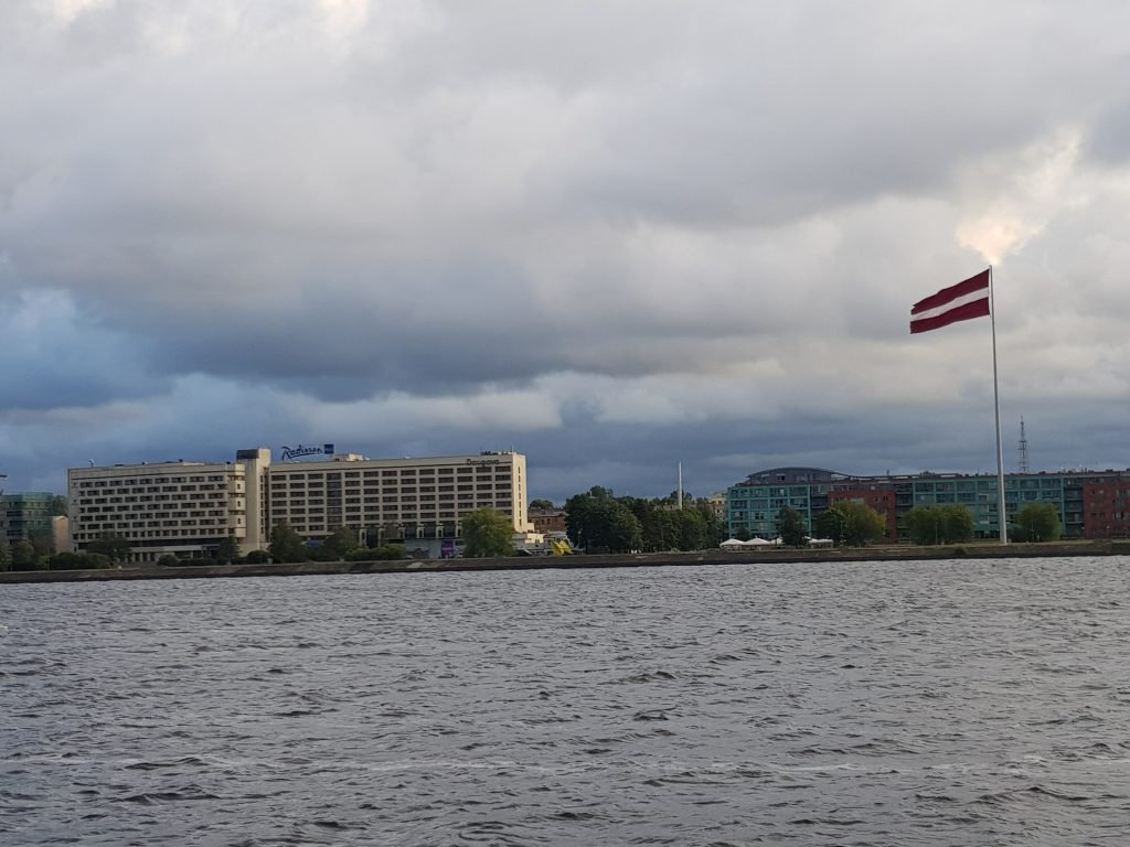 Latvian flag Riga canal